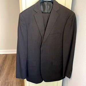 Wilke-Rodriguez modern fit three piece suit, brown.